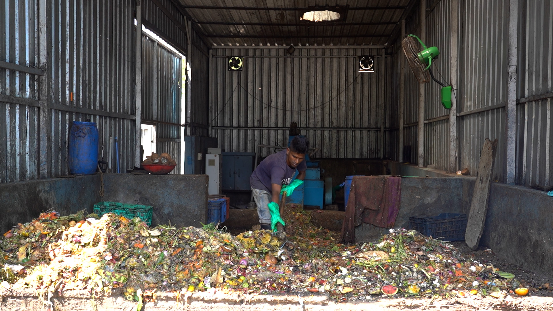 A worker clears wet waste at the Kasa Rasa plant in Koramangala.