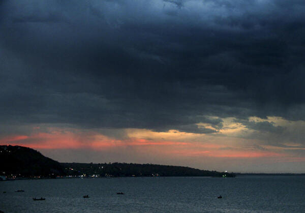 Dark clouds cover the skyline above the Upper Lake, in Bhopal, Madhya Pradesh.
