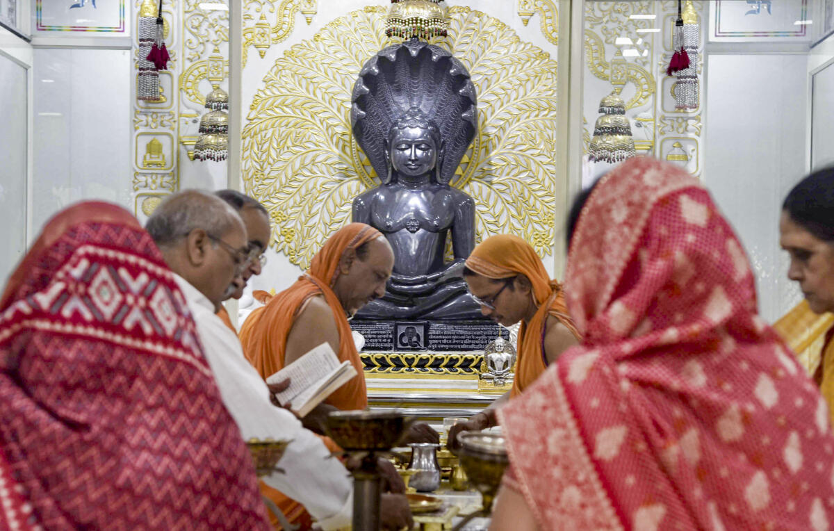 People offer prayers at a Jain temple on the occasion of Mahavir Jayanti, in Patna.