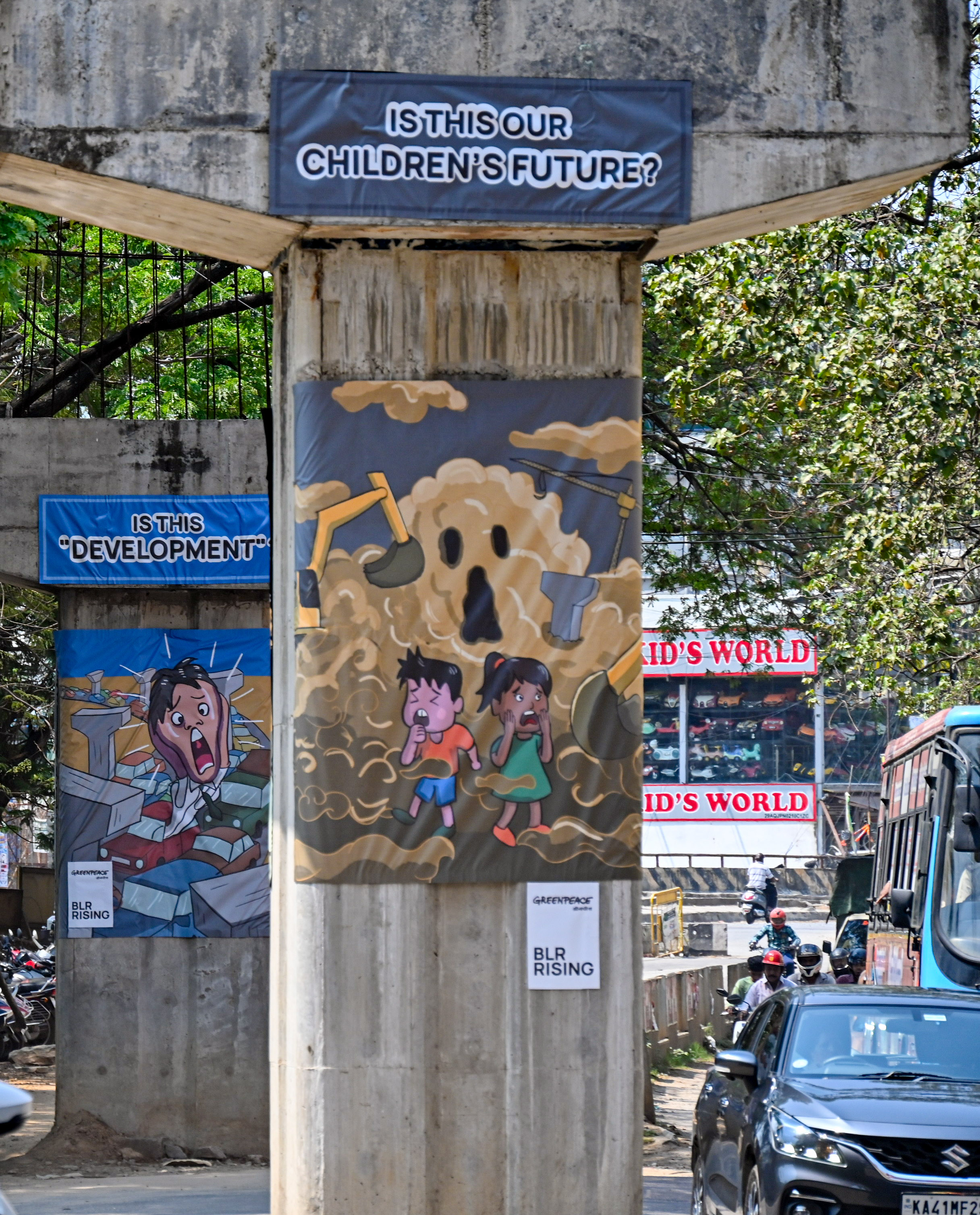 Activists turn stalled flyover pillars into a canvas of protest at Rajarajeshwari Nagar arch on Wednesday. 