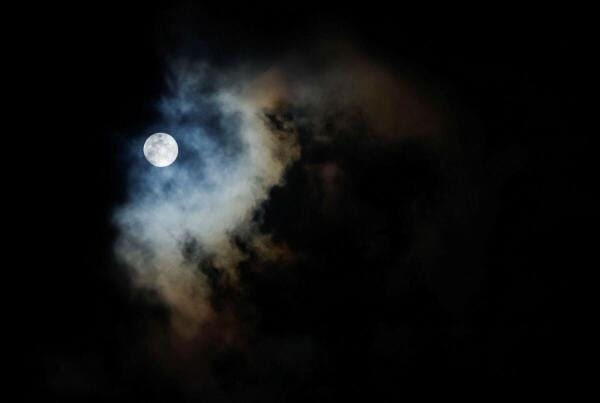 The moon is seen through storm clouds over Siggiewi, Malta.