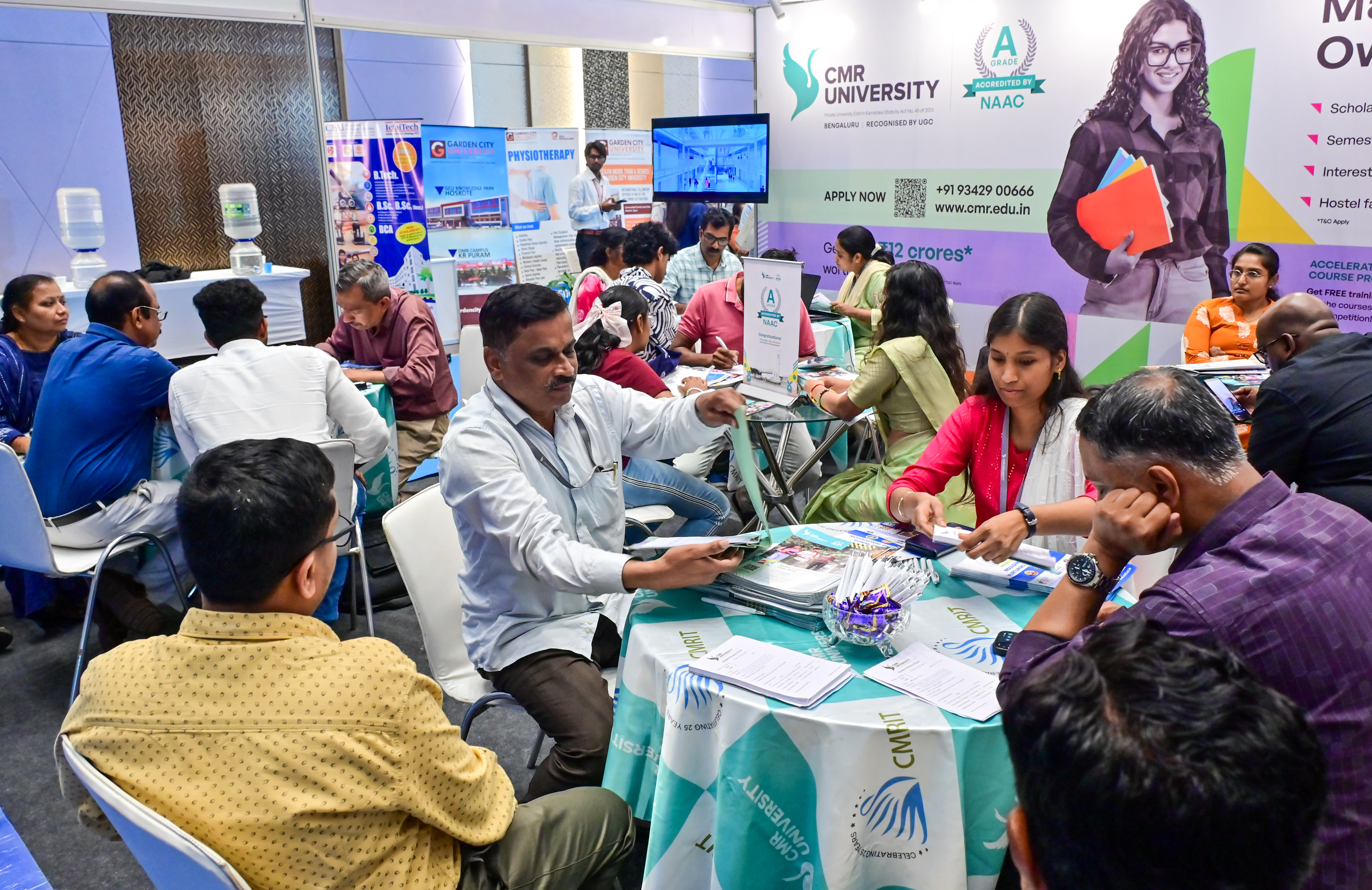 Students and parents visit a stall at the exhibition.