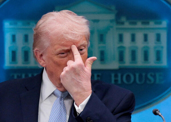 US President Donald Trump gestures as he speaks during a press conference in the James S. Brady Press Briefing Room at the White House in Washington, DC.