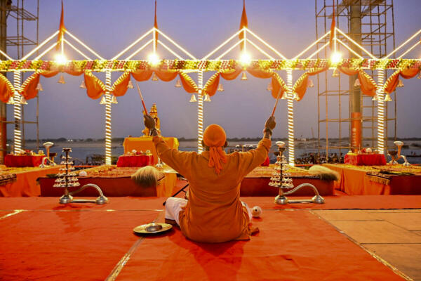 Varanasi: Musician Anandan Sivamani performs during the Ganga Aarti, at Lalita Ghat, in Varanasi.
