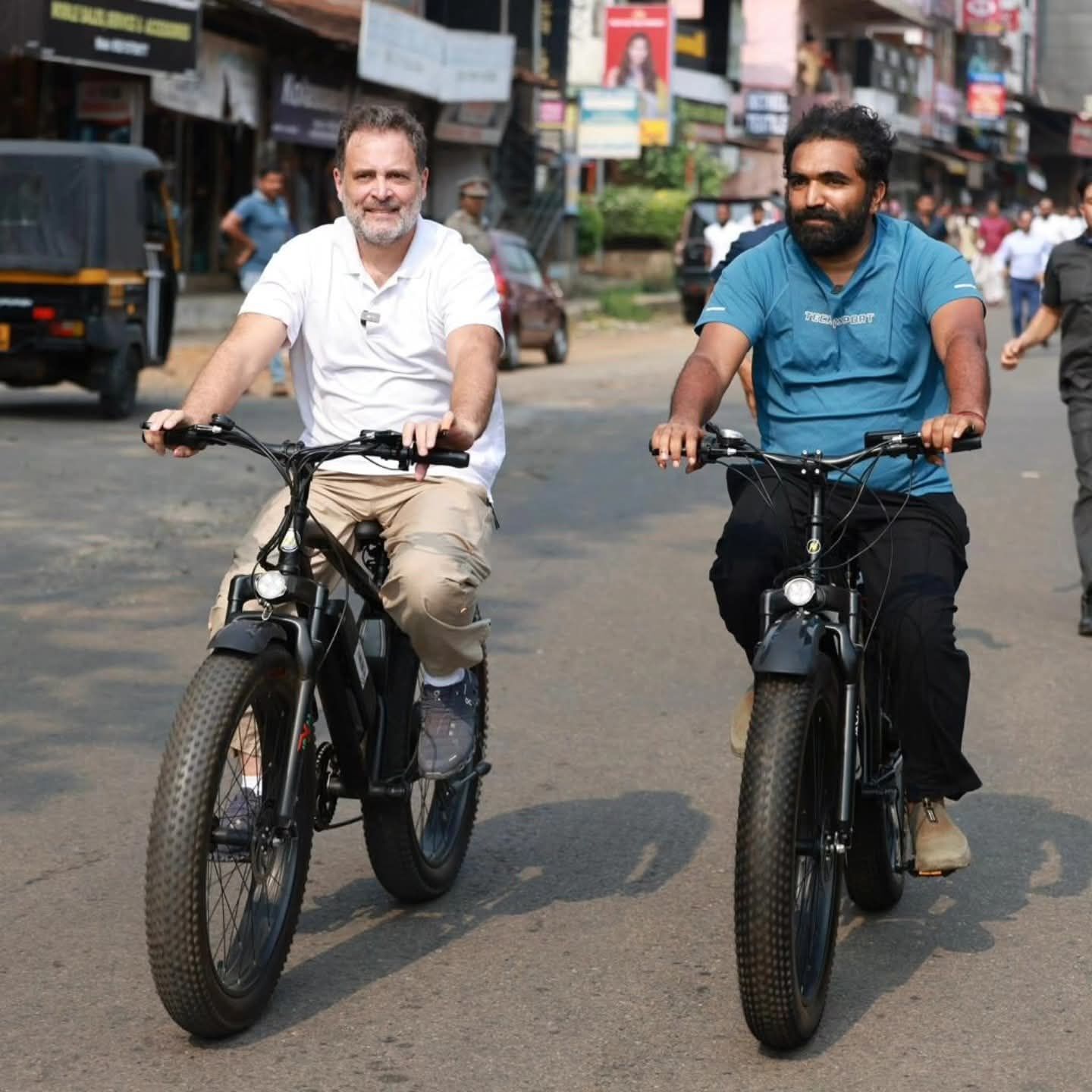Rahul Gandhi takes a bicycle ride along Chandy Oommen to be part of his green campaign.