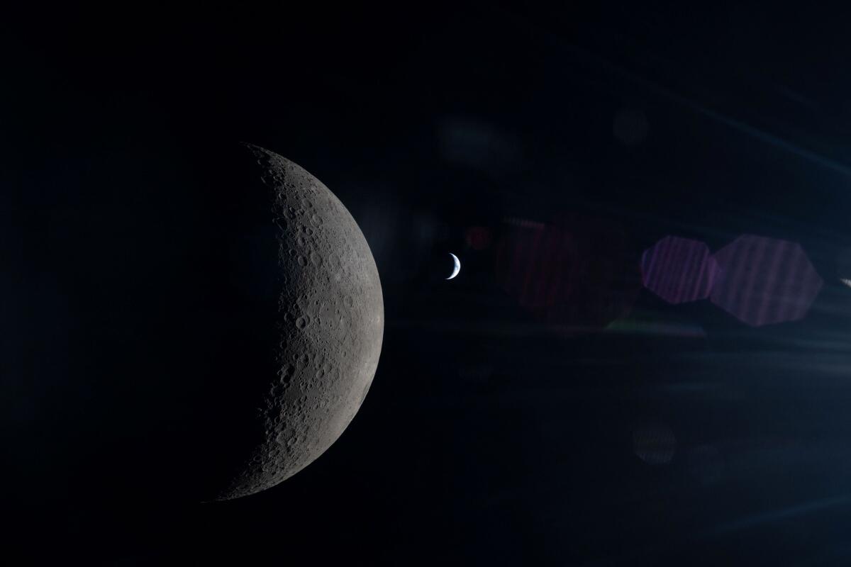 The NASA Artemis II crew photograph the moon