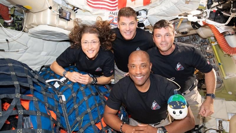 Artemis II astronauts Christina Koch, Jeremy Hansen (top), Victor Glover and Reid Wiseman (left to right). 