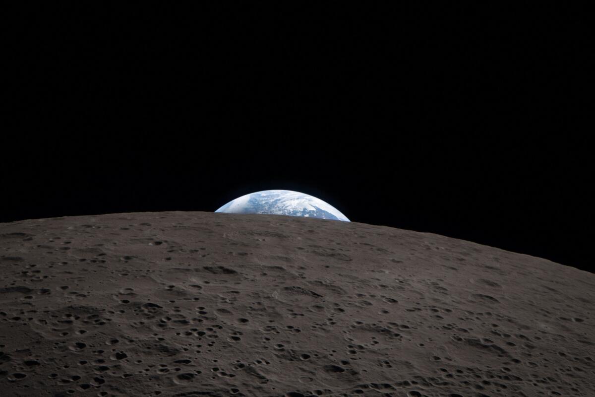 The NASA Artemis II crew photograph the moon