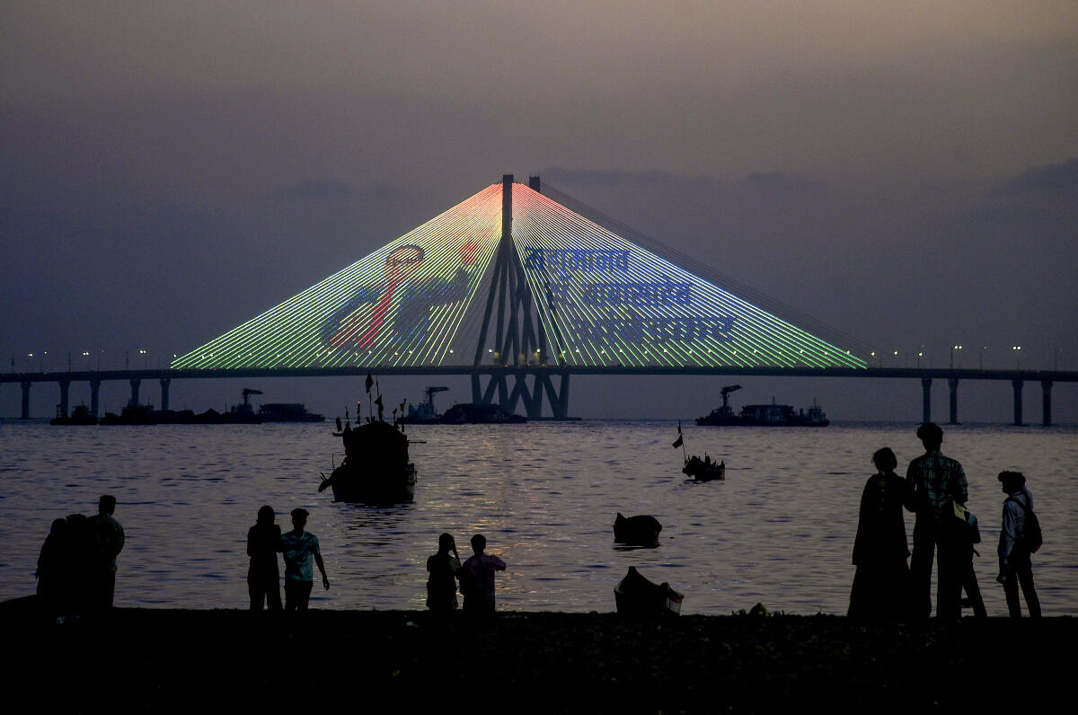 An illuminated view of the Bandra Worli Sealink on the eve of BR Ambedkar’s 135th birth anniversary, in Mumbai