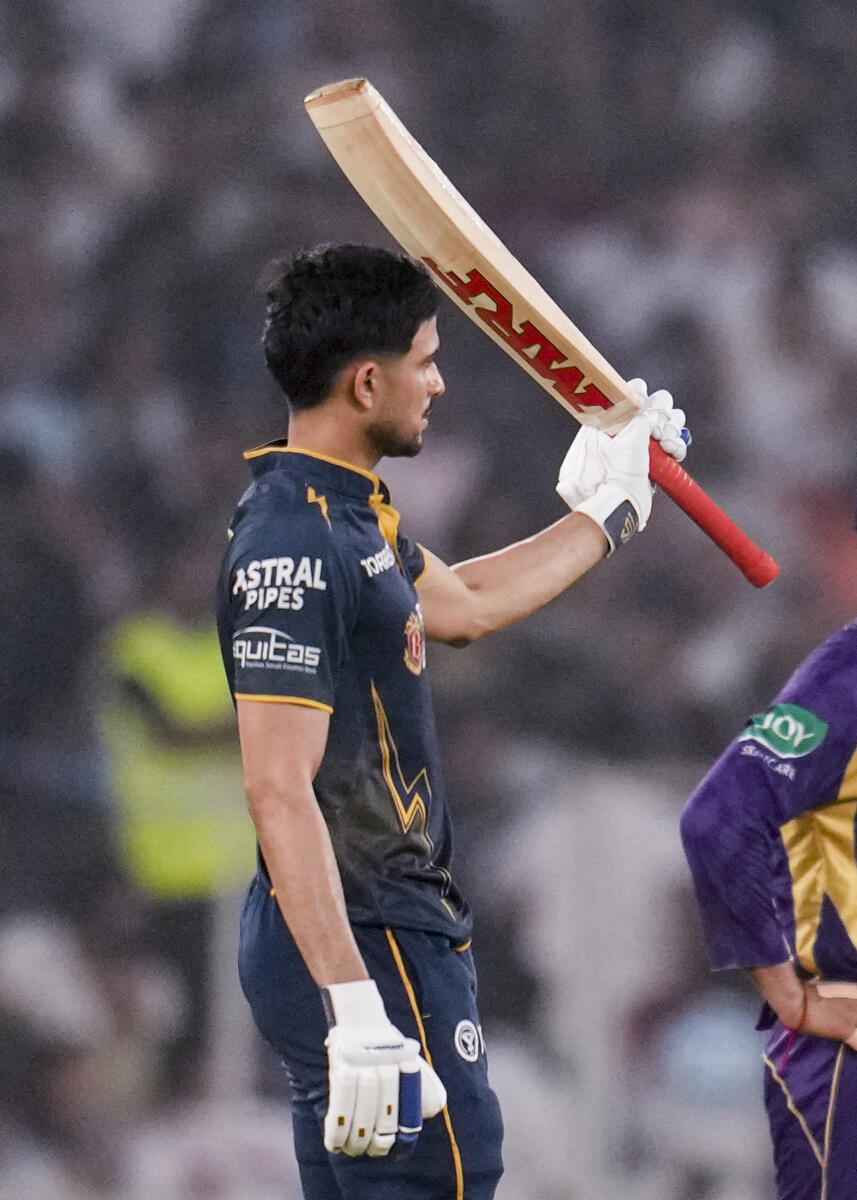 Gujarat Titans' captain Shubman Gill celebrates his half-century during the Indian Premier League (IPL) 2026 T20 cricket match between Gujarat Titans and Kolkata Knight Riders, in Ahmedabad, Gujarat. PTI
