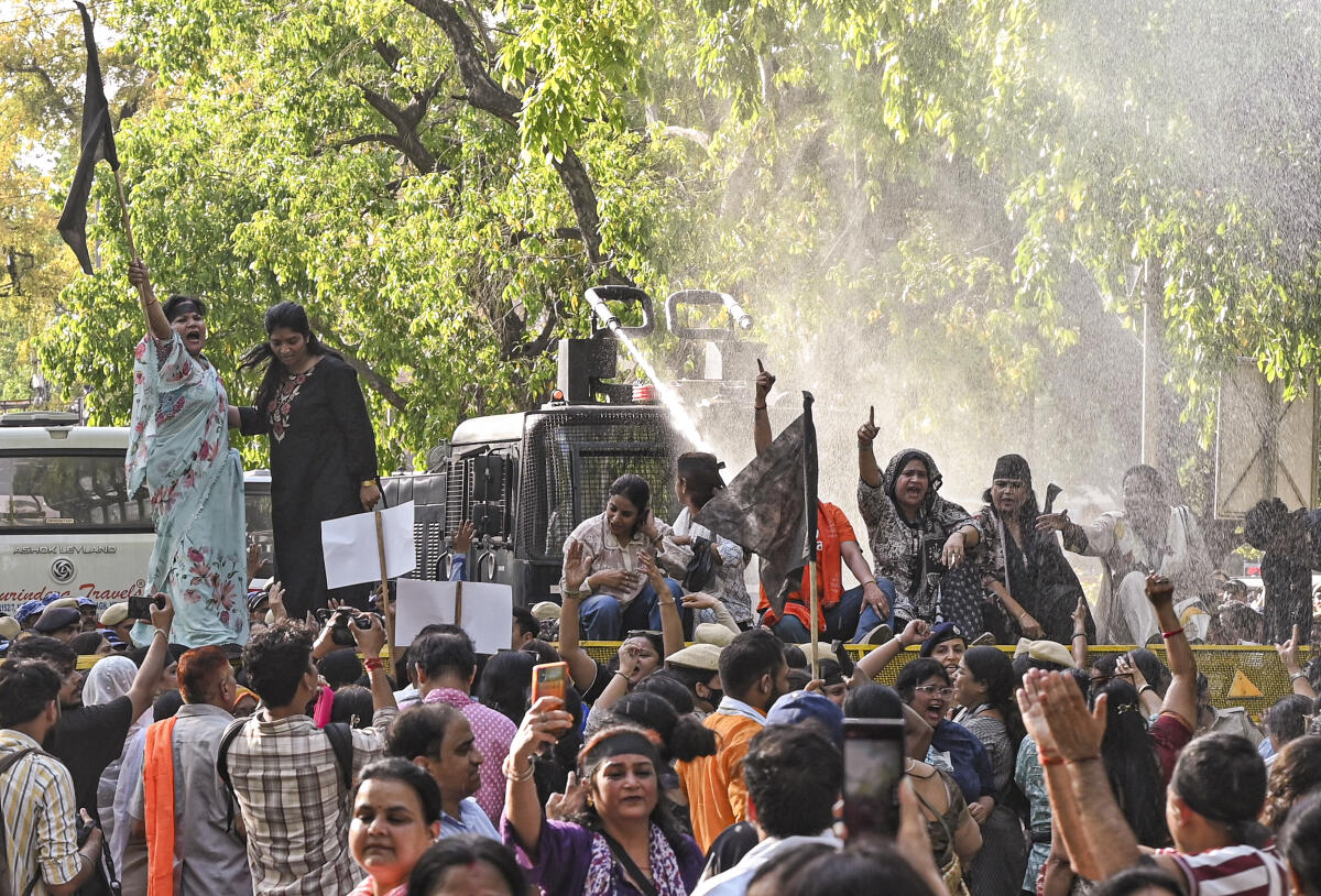 BJP women protest near Rahul Gandhi residence over women's reservation bill. PTI