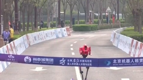 Watch: Robot outruns humans to smash world record at Beijing half marathon