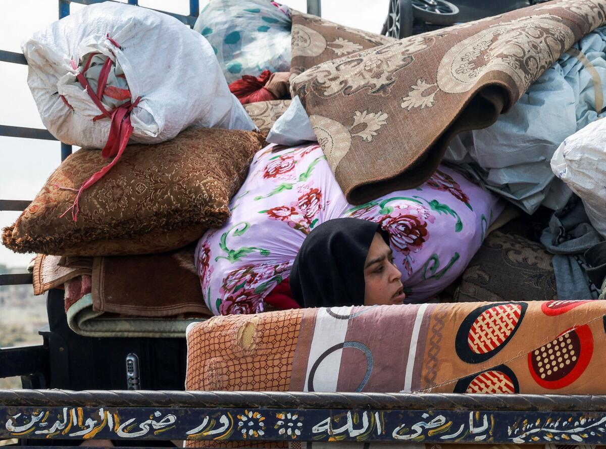 Displaced people head towards their homes in southern Lebanon.