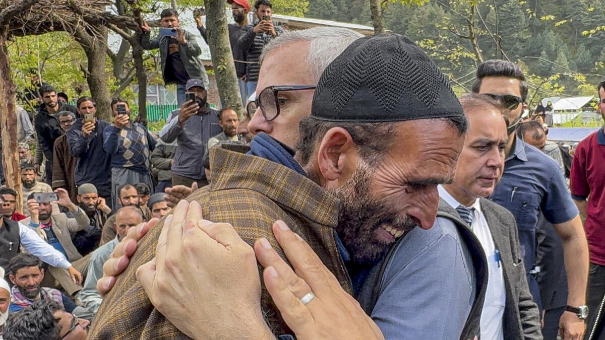 J&amp;K Chief Minister Omar Abdullah consoles the father of Adil Hussain Shah, a pony ride operator who was killed in a terrorist attack in Pahalgam on Tuesday, in Anantnag district, Jammu &amp; Kashmir, Wednesday, April 23, 2025.