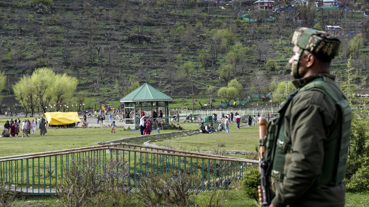 A security personnel keeps vigil ahead of the first anniversary of the Pahalgam terror attack in which 26 people were shot dead by Lashkar-e-Taiba terrorists on April 22 last year, at Pahalgam in Anantnag, Sunday, April 19, 2026.