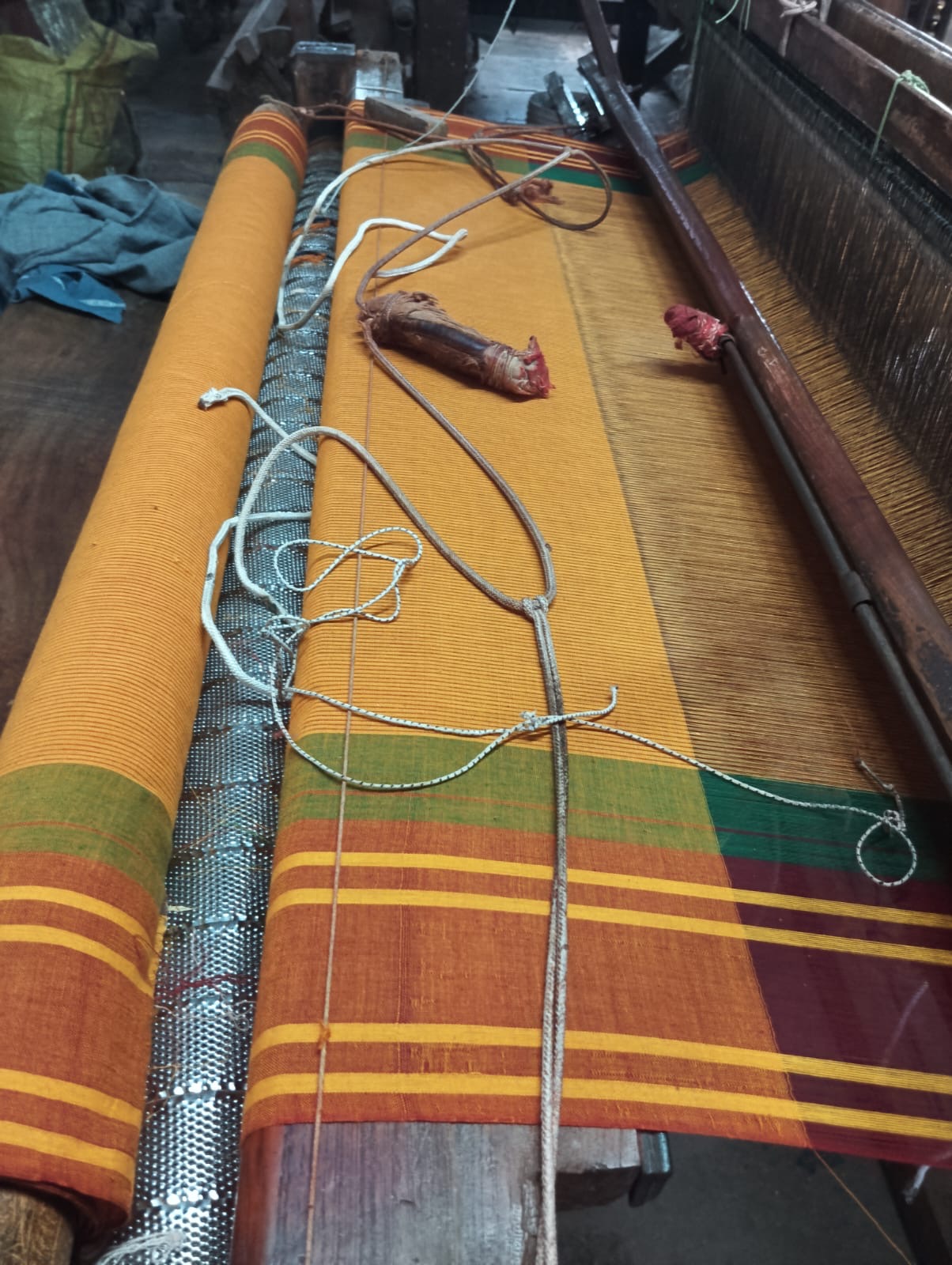 A Sudha Kadi saree getting ready on the loom. 