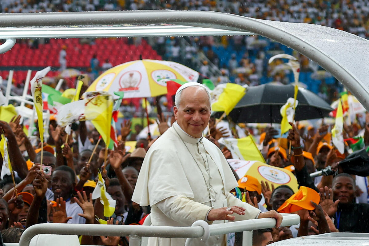 Pope Leo XIV arrives for a meeting with young people and families at Bata Stadium, in Bata, Equatorial Guinea.