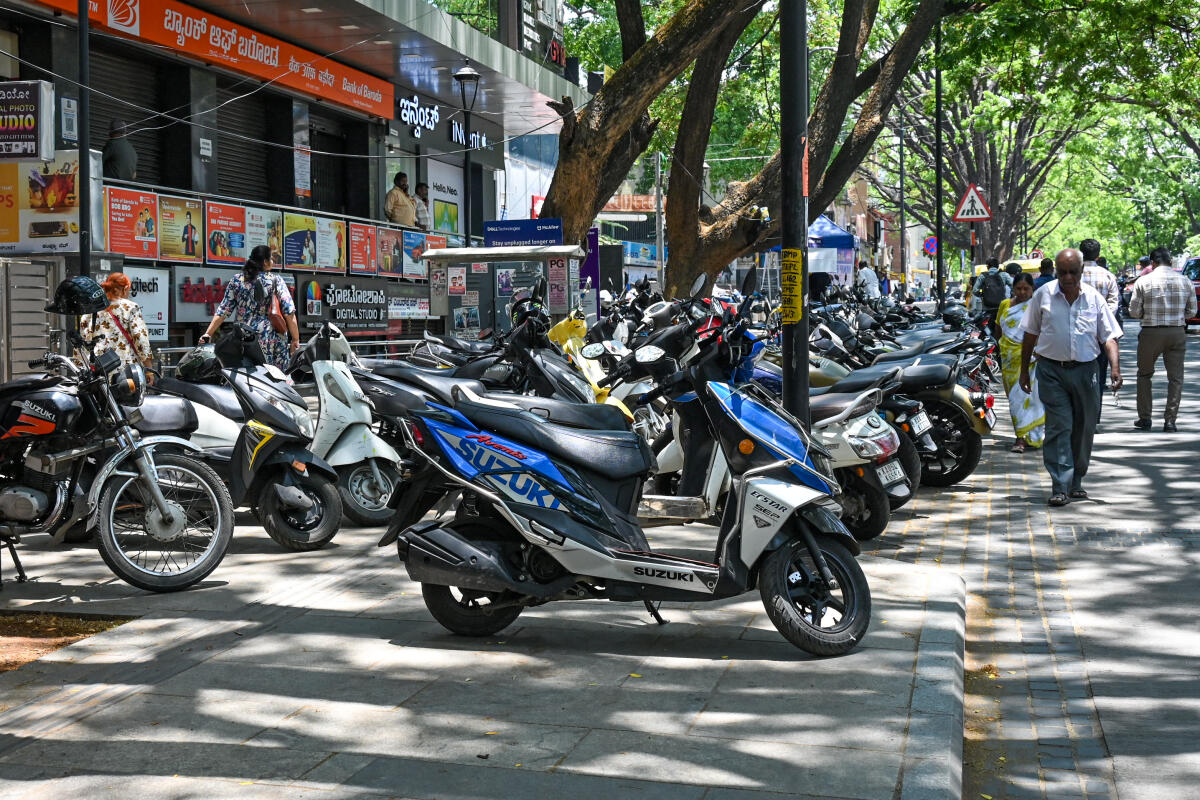  Vehicles occupy the widened footpath, forcing pedestrians onto the road, with weak enforcement parking has gone unchecked.