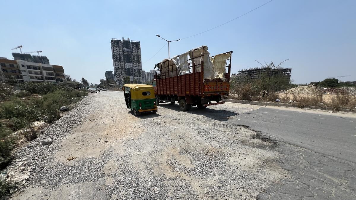 For Bengaluru school kids, bad
roads are part of the timetable