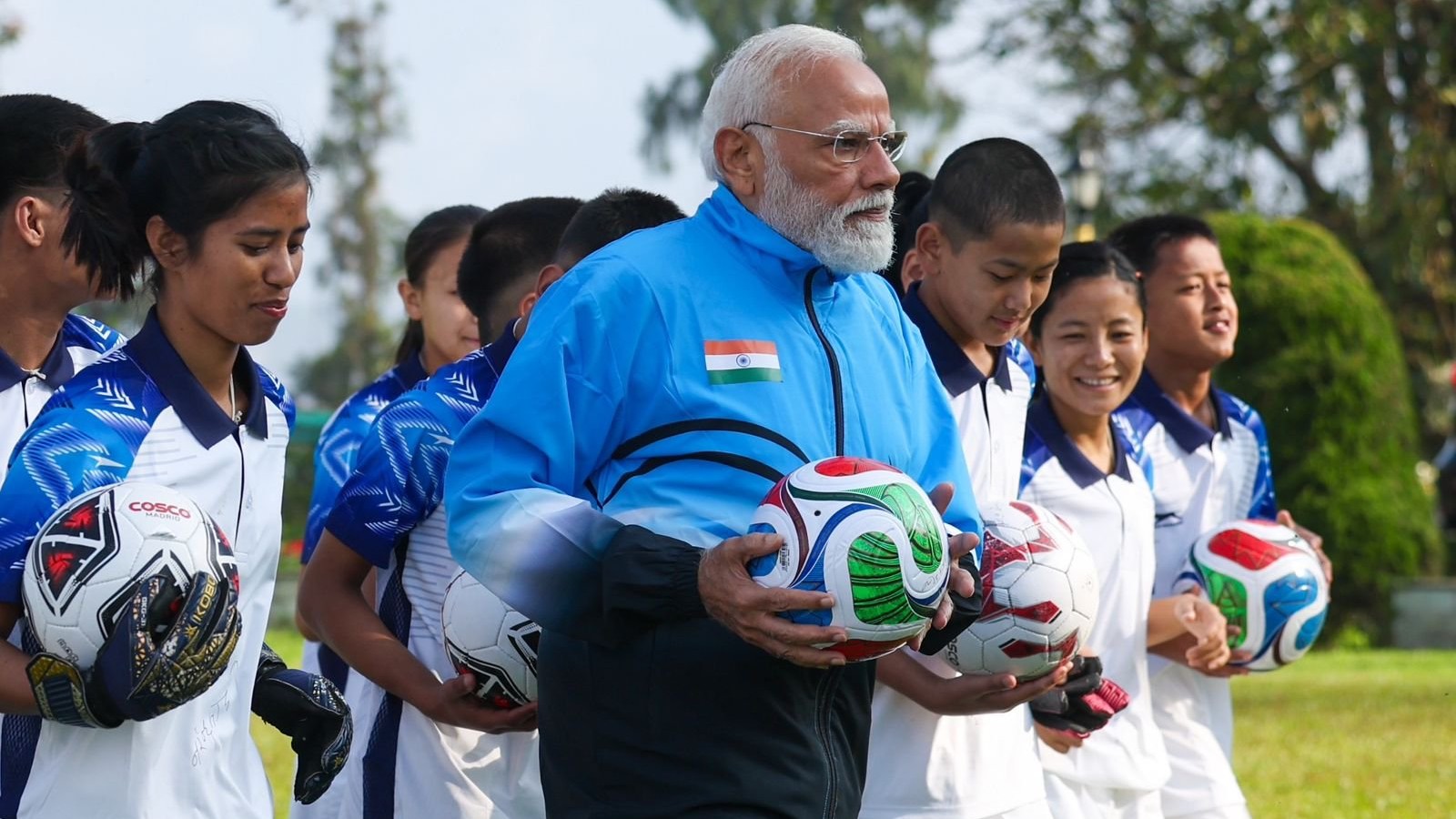 Photos | PM Modi plays energising game of football with children in Sikkim