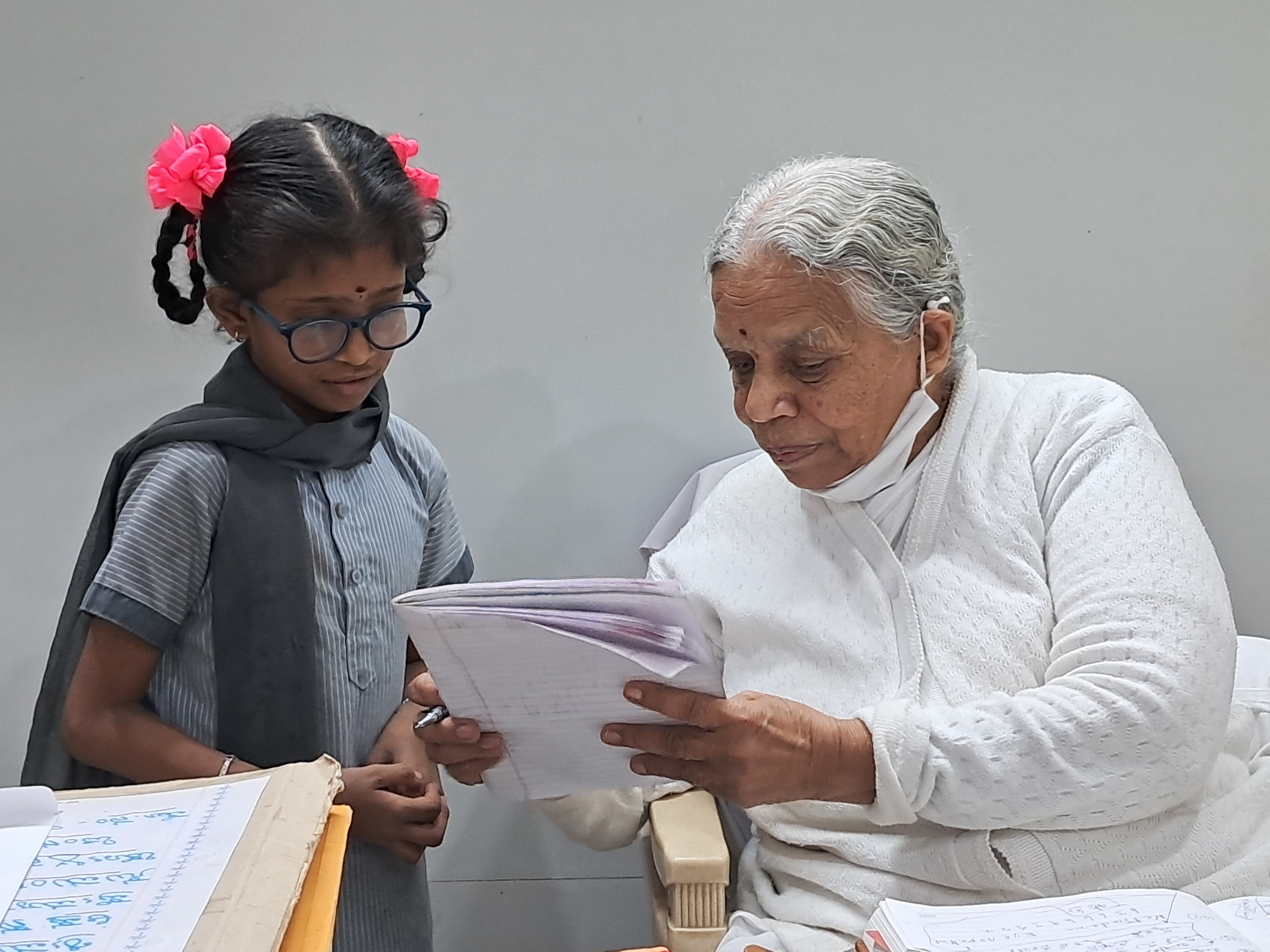 S G Susheelamma guides a child at the Sumangali Seva Ashrama. Photo by author