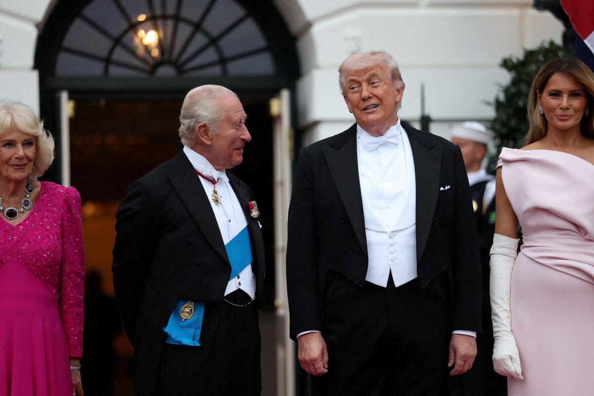 U.S. President Donald Trump, first lady Melania Trump, Britain's King Charles and Queen Camilla stand together ahead of a state dinner at the White House in Washington, D.C., U.S., April 28, 2026.