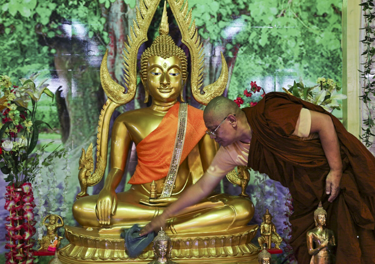 A Buddhist monk makes arrangements ahead of the 2570th birth anniversary of Gautam Buddha at a temple, in Thane, Wednesday, April 29, 2026.