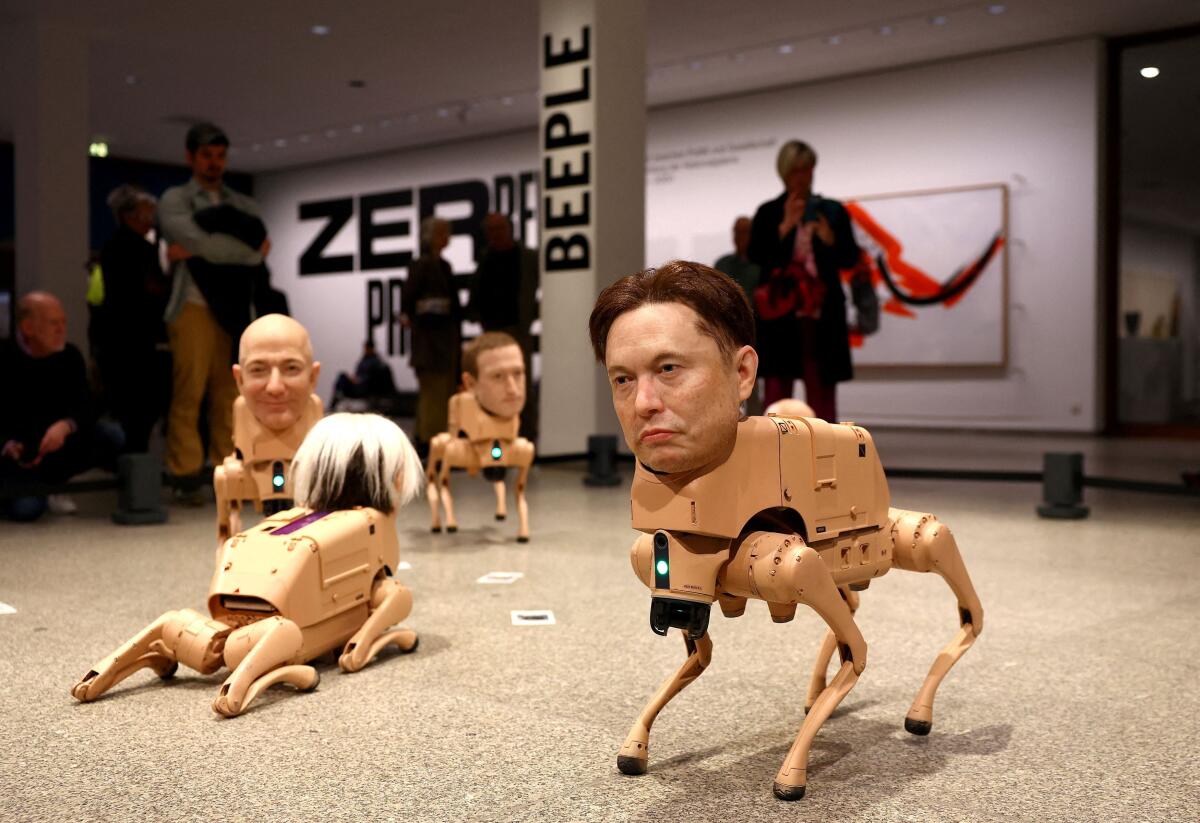 Visitors view robotic dogs with silicone heads modelled after Elon Musk, Jeff Bezos, Mark Zuckerberg and others, at the interactive art installation 'Beeple. Regular Animals' by the artist Beeple (Mike Winkelmann), at the Neue Nationalgalerie in Berlin, Germany, April 30, 2026.