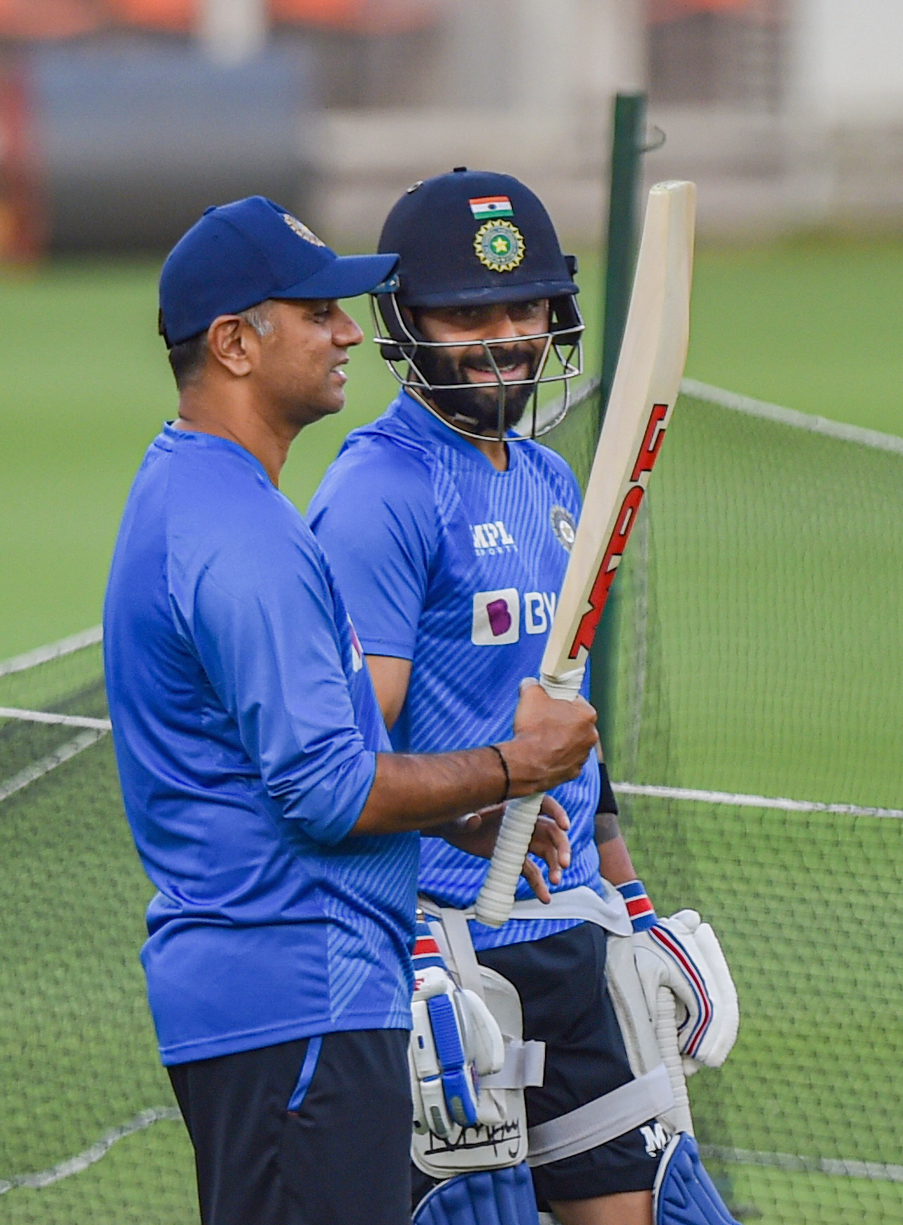 In this file photo Rahul Dravid checks Virat Kohli