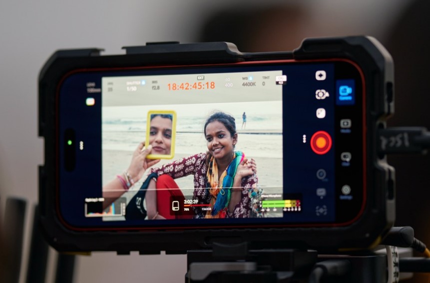 Ritesh Sharma uses the Blackmagic Camera app on iPhone 17 Pro Max while framing Maruti, his film’s protagonist, selling trinkets on the beach.