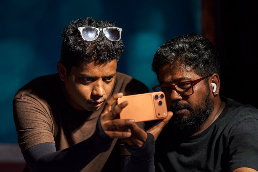 Cinematographer Naseem Azad (left) and filmmaker Robin Joy use Action mode on iPhone 17 Pro Max to keep the frame stable.