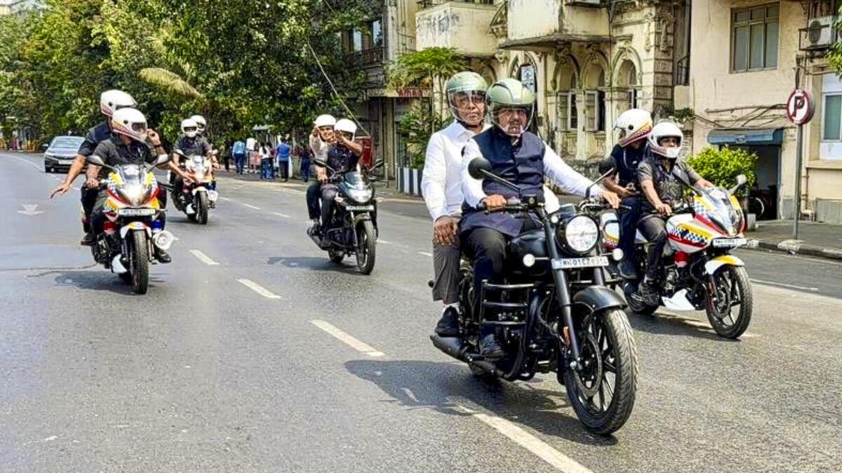 'Will police now issue challan to CM': Oppn slams Fadnavis for riding bike with expired PUC to Vidhan Bhavan