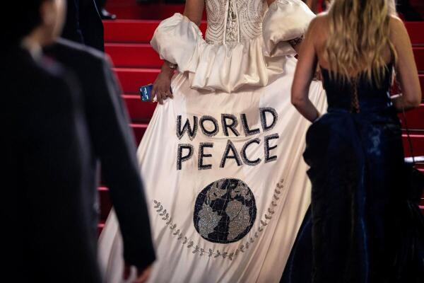 A guest poses on the red carpet during arrivals for the screening of the film "L'objet du delit" (Crescendo) Out of competition at the 79th Cannes Film Festival in Cannes, France.