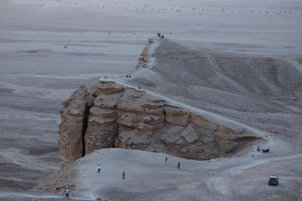 A general view of mountains after sunset at Jebel Fihrayn, also known as "The Edge of the World", one of Saudi Arabia's natural wonders, where cliff formations offer panoramic views of the desert, at the outskirts of Riyadh, Saudi Arabia.