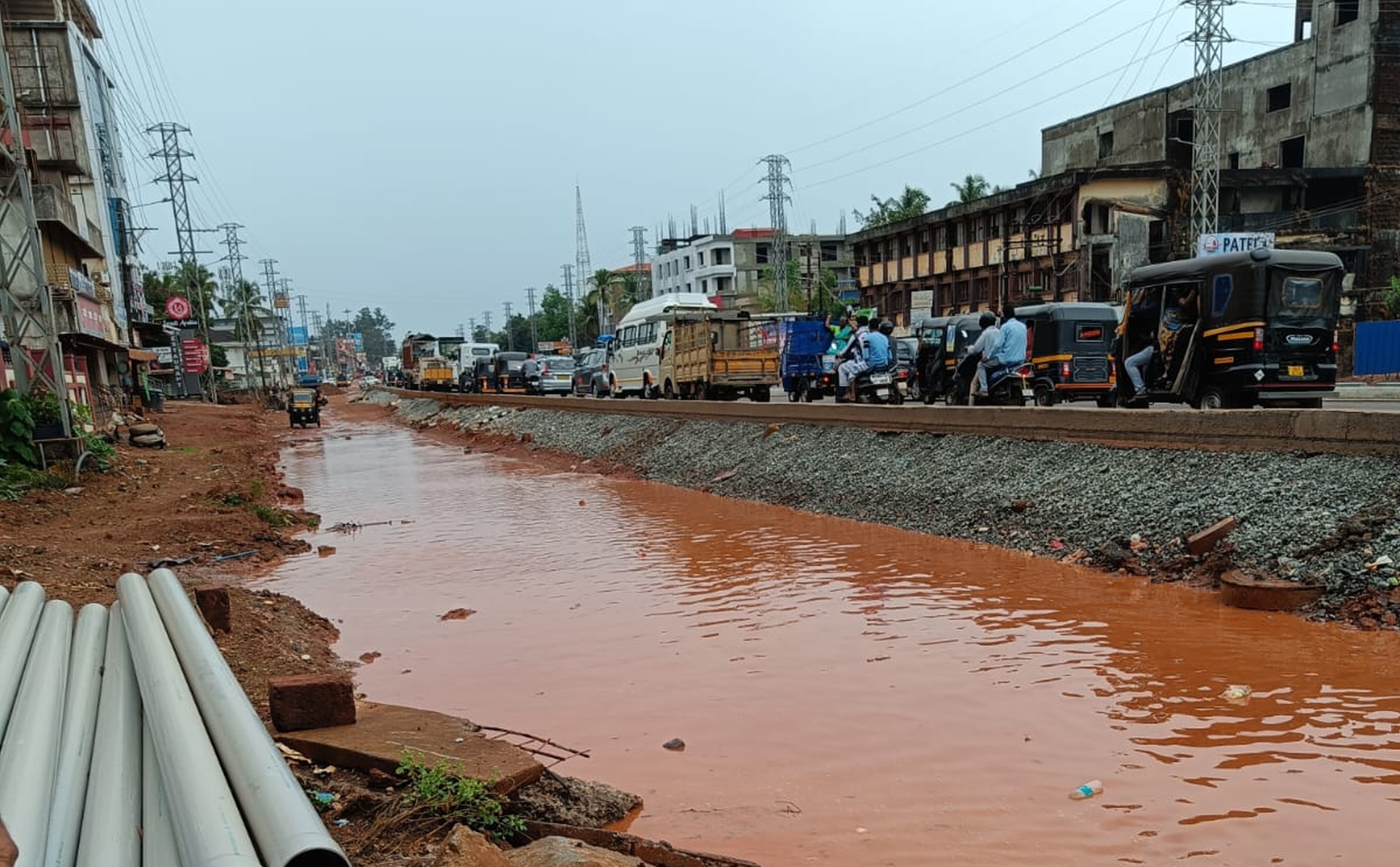 Rainwater accumulates at National Highway widening site near Ranginakatta in Bhatkal, Uttara Kannada district.