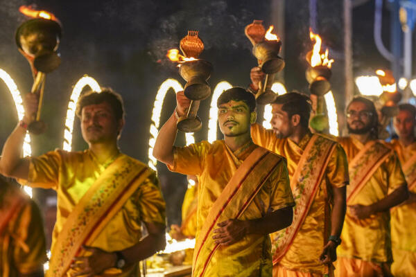 Priests perform Ganga Aarti on the occasion of 'Ganga Dussehra', at Babughat, in Kolkata, West Bengal.