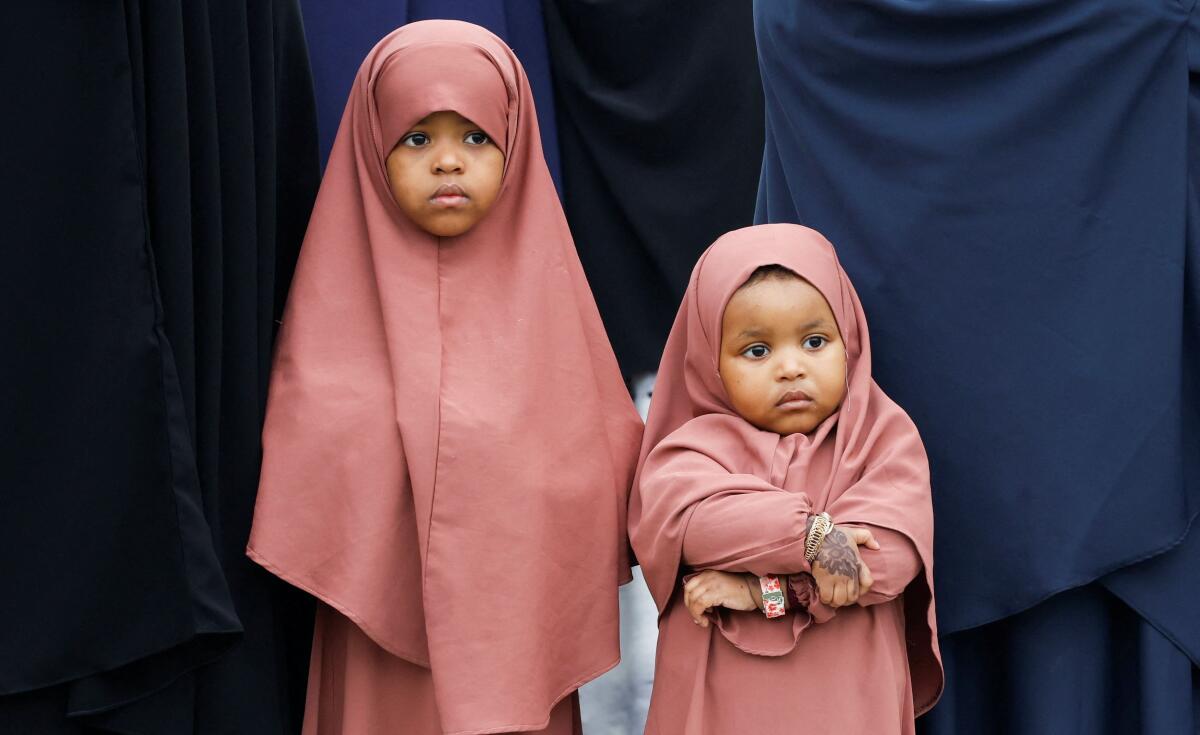 Muslim faithful attend prayers to mark the Muslim holiday of Eid al-Adha at the Sir Ali Muslim Club Ground in Nairobi, Kenya.