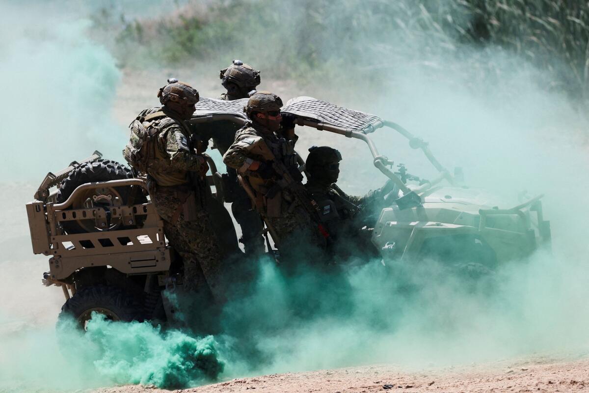 Members of the Portuguese Army participate in Exercise ORION 26, which brings together more than 1,300 troops from Portugal, Spain, France, Italy and Romania, in Santa Margarida da Coutada, Portugal.