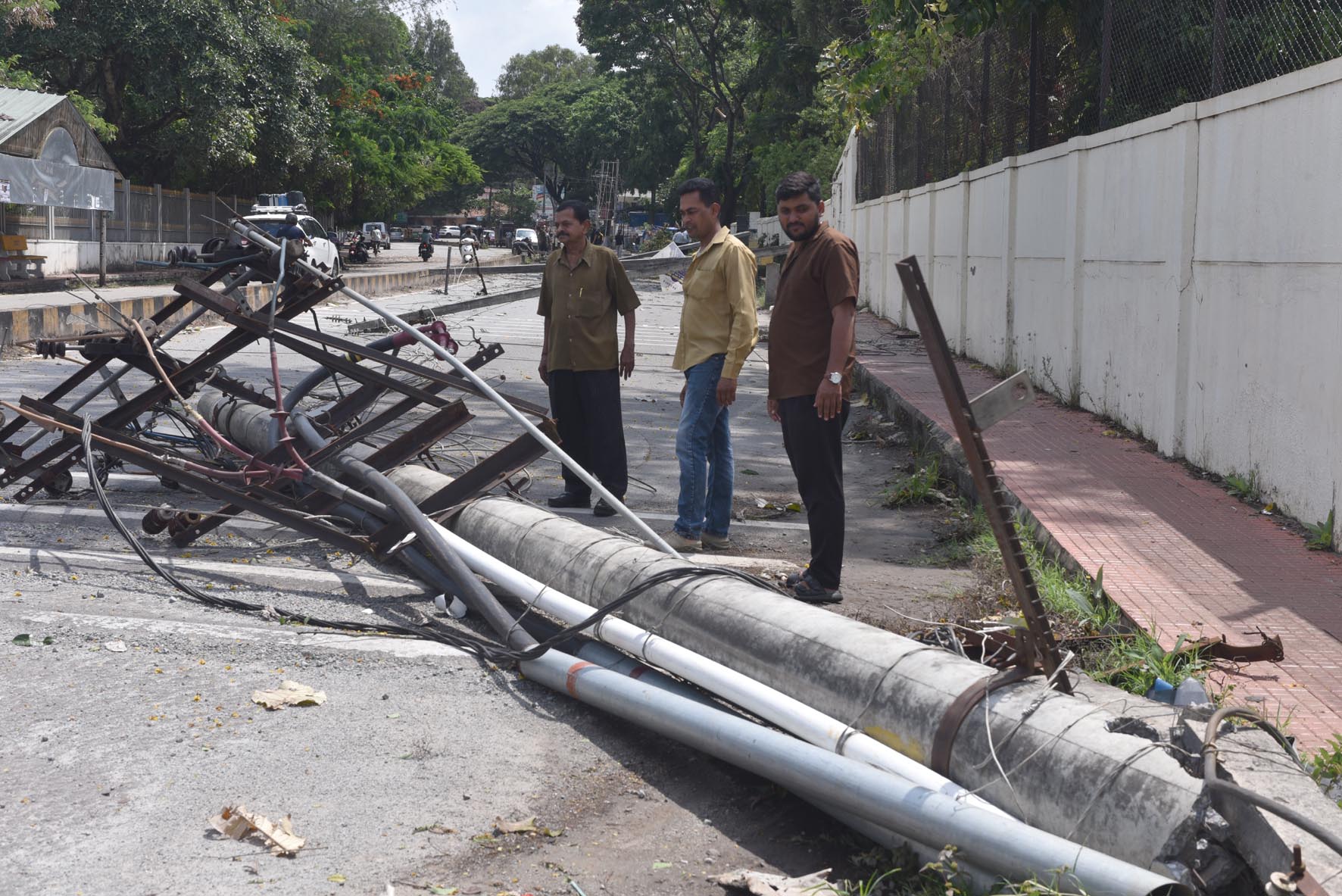 Heavy rain coupled with strong winds uproot an electrical pole in Chikkamagaluru.