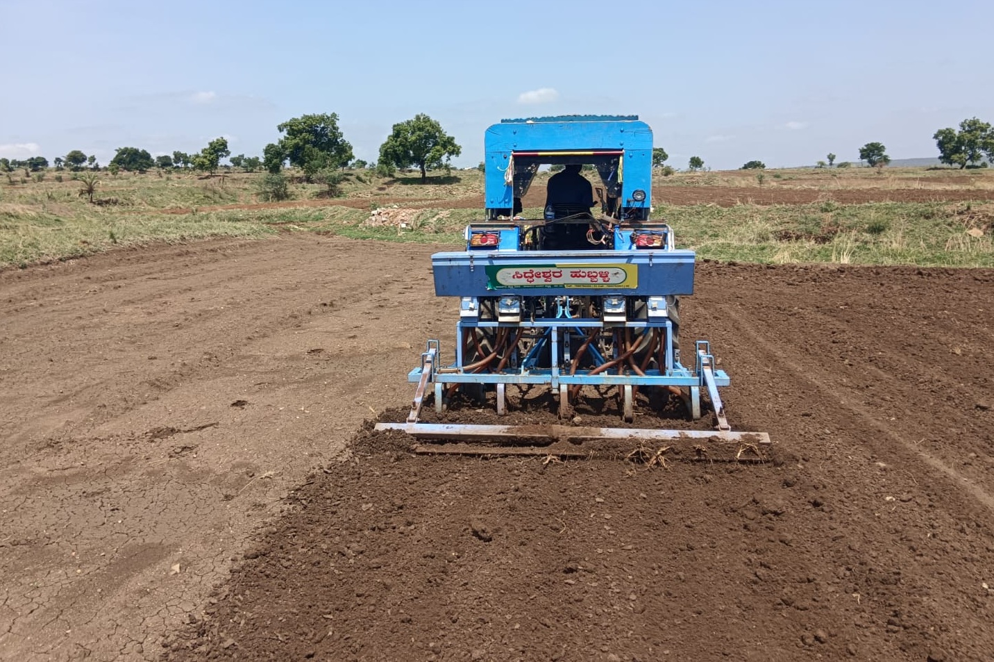 A farmer on the outskirts of Belagavi on Sunday uses a tractor to till his field for the sowing. dh photos