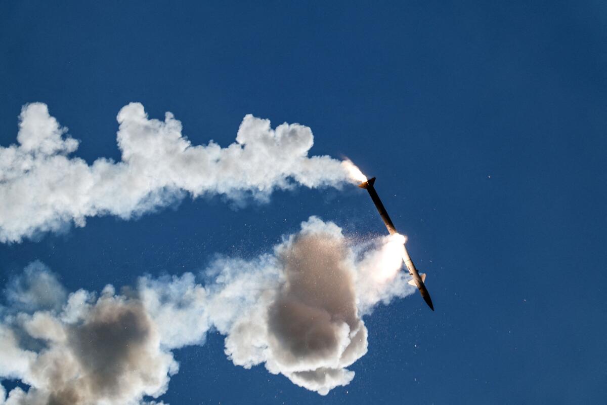 A faulty interceptor missile launched by Israel’s Iron Dome anti-missile system disintegrates above southern Lebanon, shortly after being launched by Israel