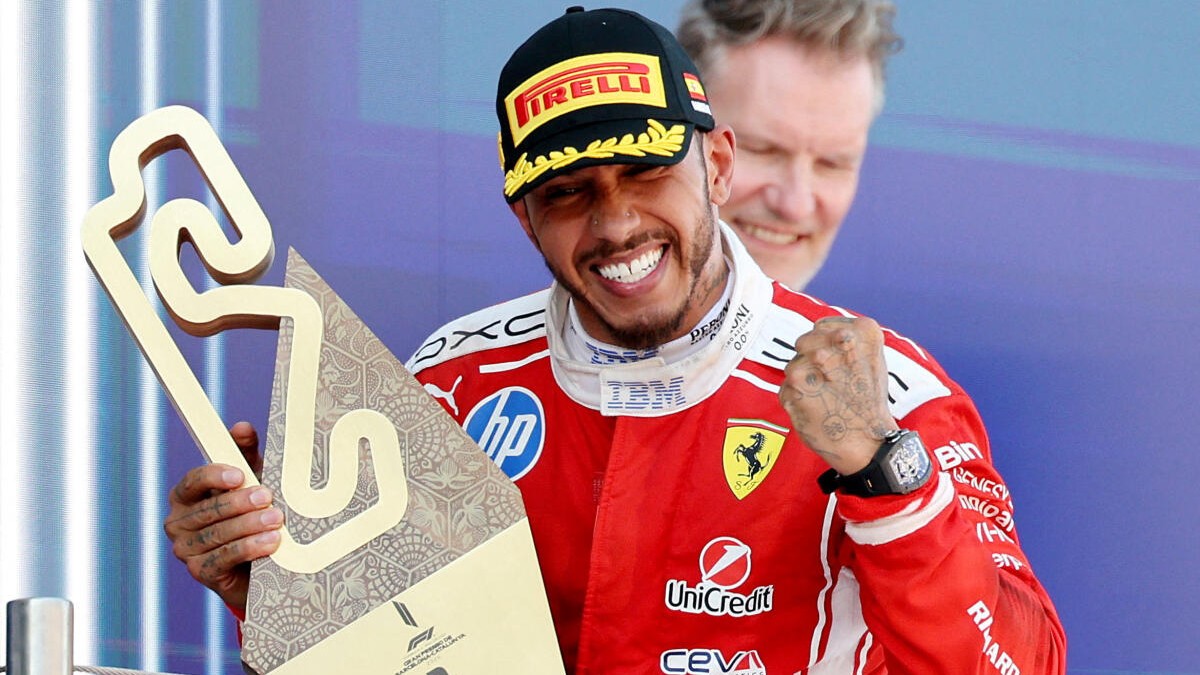 Lewis Hamilton redeems himself at Barcelona with first victory wreathed in red
