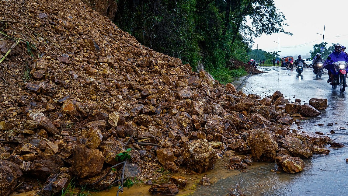 Landslide strikes busy Ghodbunder Road in Thane, Maharashtra; emergency teams clear debris with no reported casualties.