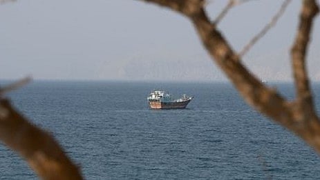 Vessel struck by unknown projectile in Strait of Hormuz, crew casualty ...