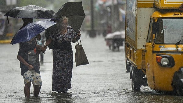 Mumbai gets heavy showers after weeks of lull; IMD forecasts more rains with gusty winds