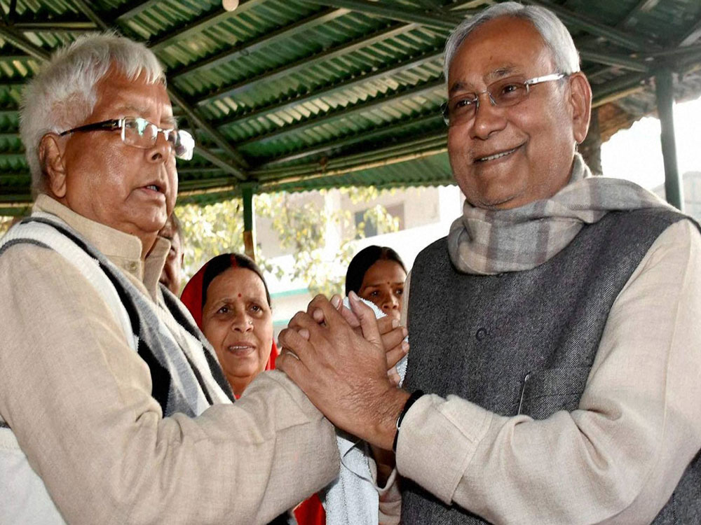 Janata Dal (United) president and Bihar Chief Minister Nitish Kumar with Lalu Prasad Yadav and Rabri Devi. 