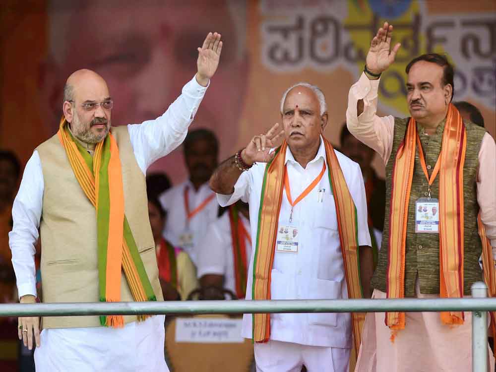 State BJP President B S Yeddyurappa seen with BJP President Amit Shah.