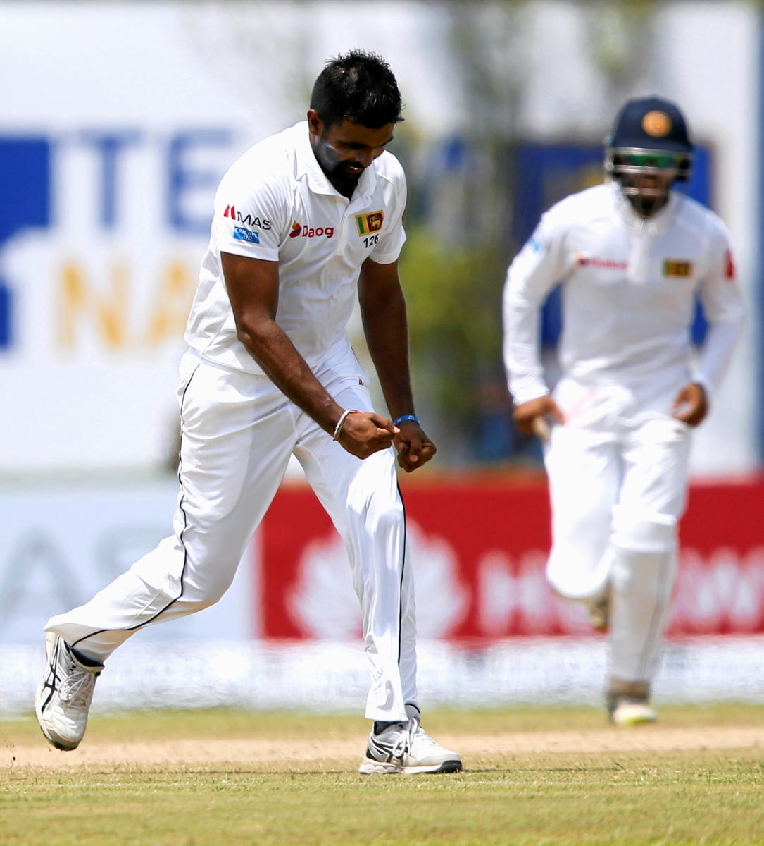 Spinners put Lanka on top