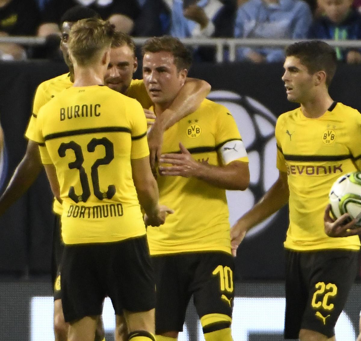 Dortmund ease past Man City