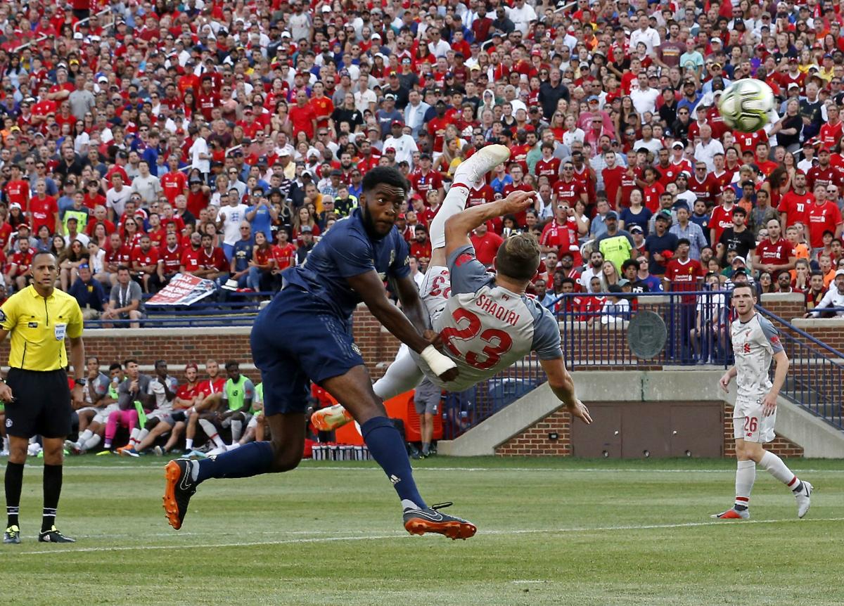 Shaqiri shines as Liverpool rout United